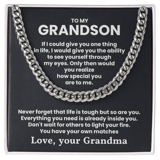 Cuban link chain necklace with heartfelt "To My Grandson" message from Grandma about inner strength on a black background.