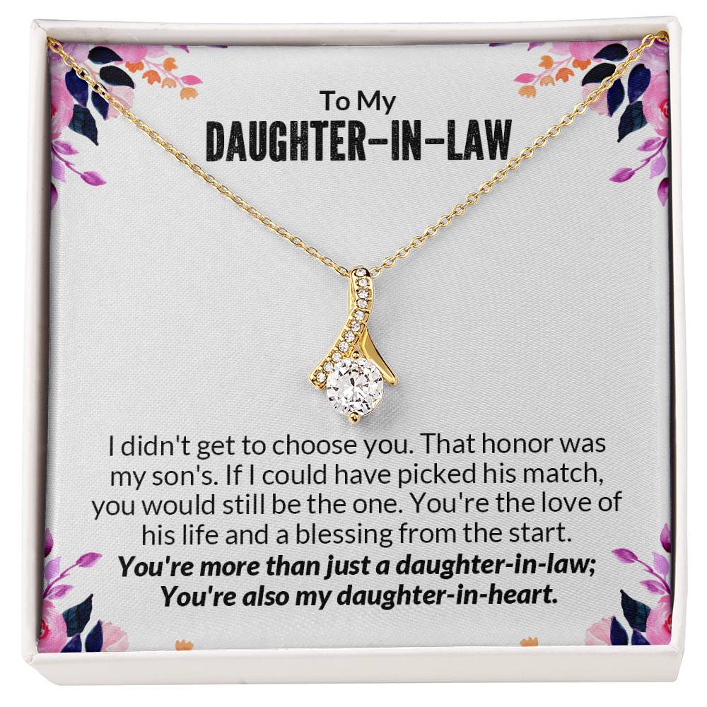 Gold ribbon-shaped pendant necklace for daughter-in-law with heartfelt message in gift box.