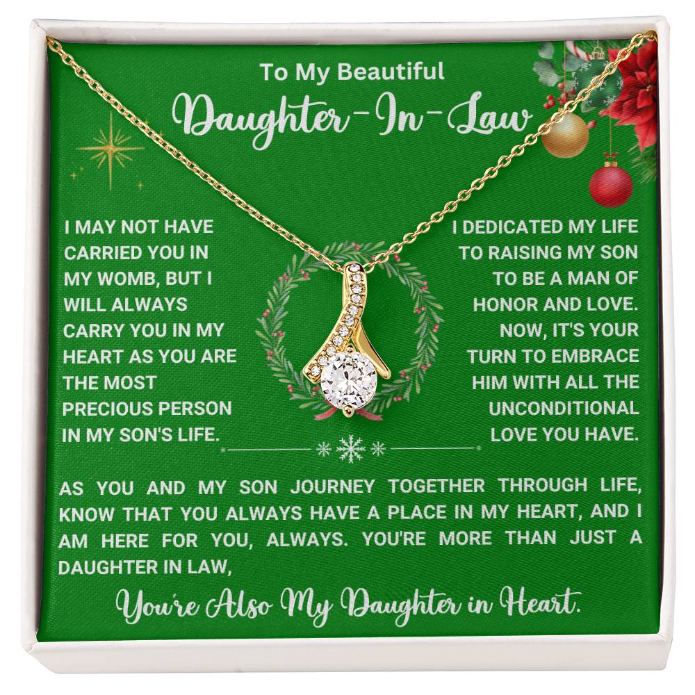 Christmas necklace gift for daughter-in-law with heartfelt message and ribbon-shaped pendant in elegant gift box.