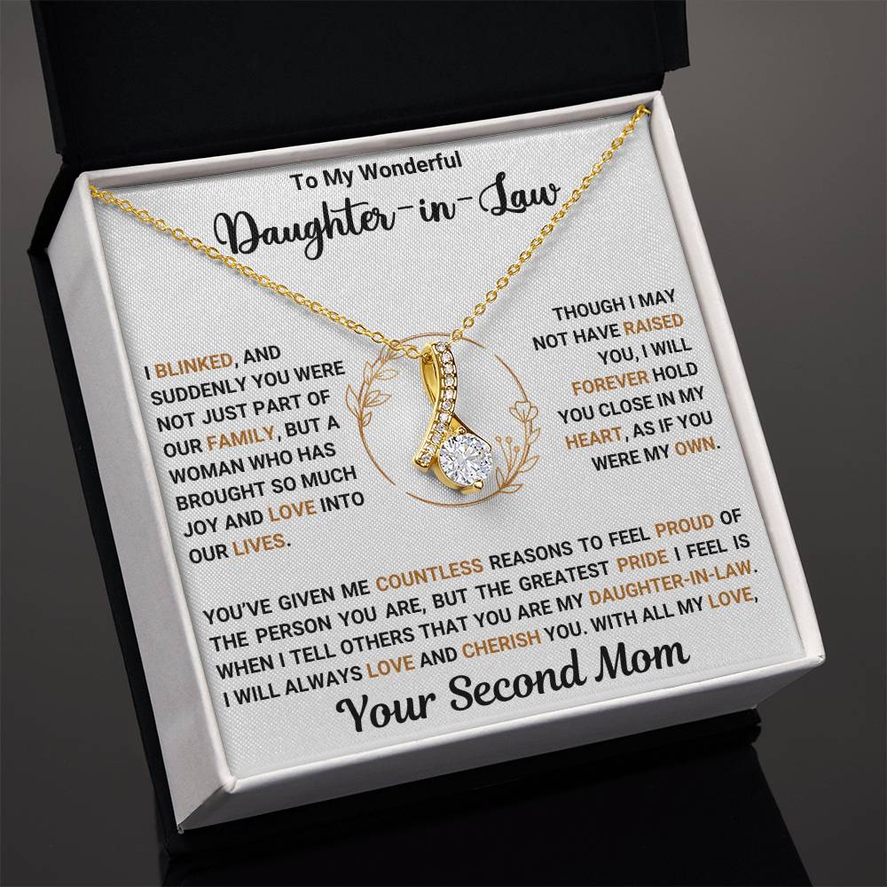 "Alluring Beauty necklace for daughter-in-law with heartfelt message and ribbon-shaped pendant in gift box"