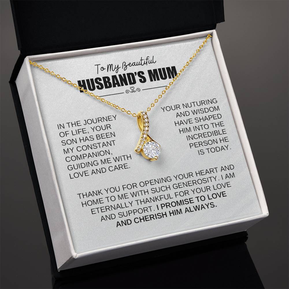 Alluring Beauty necklace in gift box for husband’s mum, featuring ribbon pendant and heartfelt message. Perfect appreciation gift.