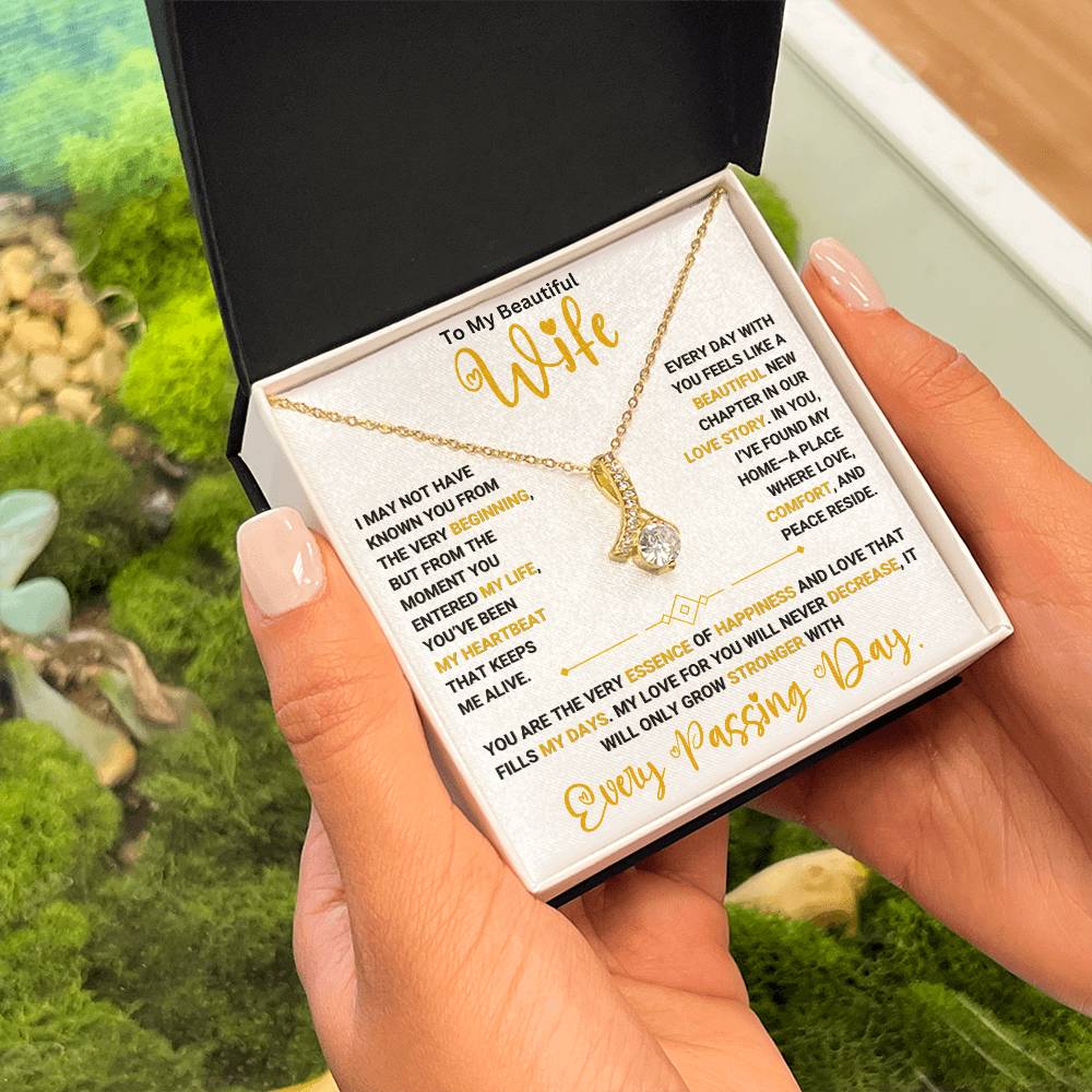 Woman holding "To My Beautiful Wife" Alluring Beauty necklace gift box with heartfelt message - perfect gift for wife, 50% off + free shipping