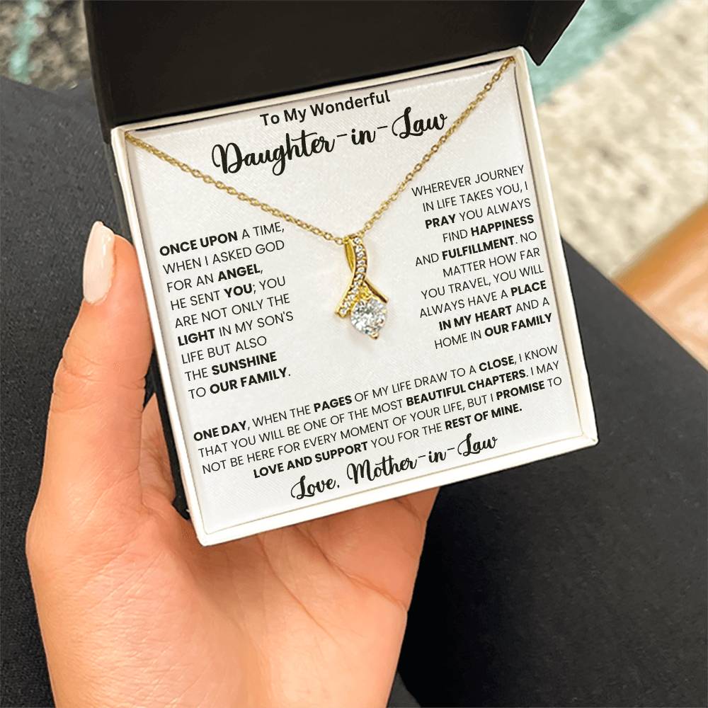 Gold necklace for daughter-in-law with heartfelt message, perfect gift for special occasions. Elegant design with ribbon-shaped pendant.