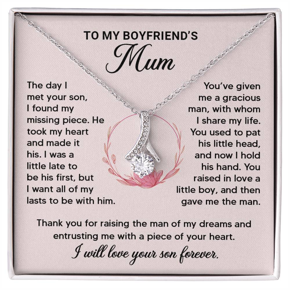 Elegant ribbon-shaped necklace displayed in a gift box with heartfelt message for boyfriend's mum. Perfect appreciation gift.