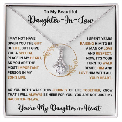 Alluring Beauty necklace for daughter-in-law with heartfelt message, ribbon pendant design, perfect gift for special occasions.