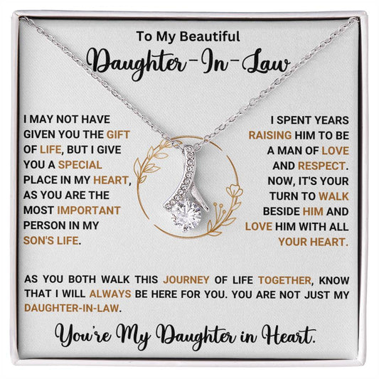 Alluring Beauty necklace for daughter-in-law with heartfelt message, ribbon pendant design, perfect gift for special occasions.