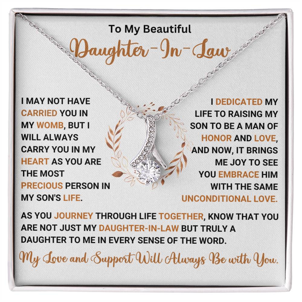 Alluring Beauty Necklace with heartfelt message for daughter-in-law - perfect gift, featuring petite ribbon shaped pendant and loving words