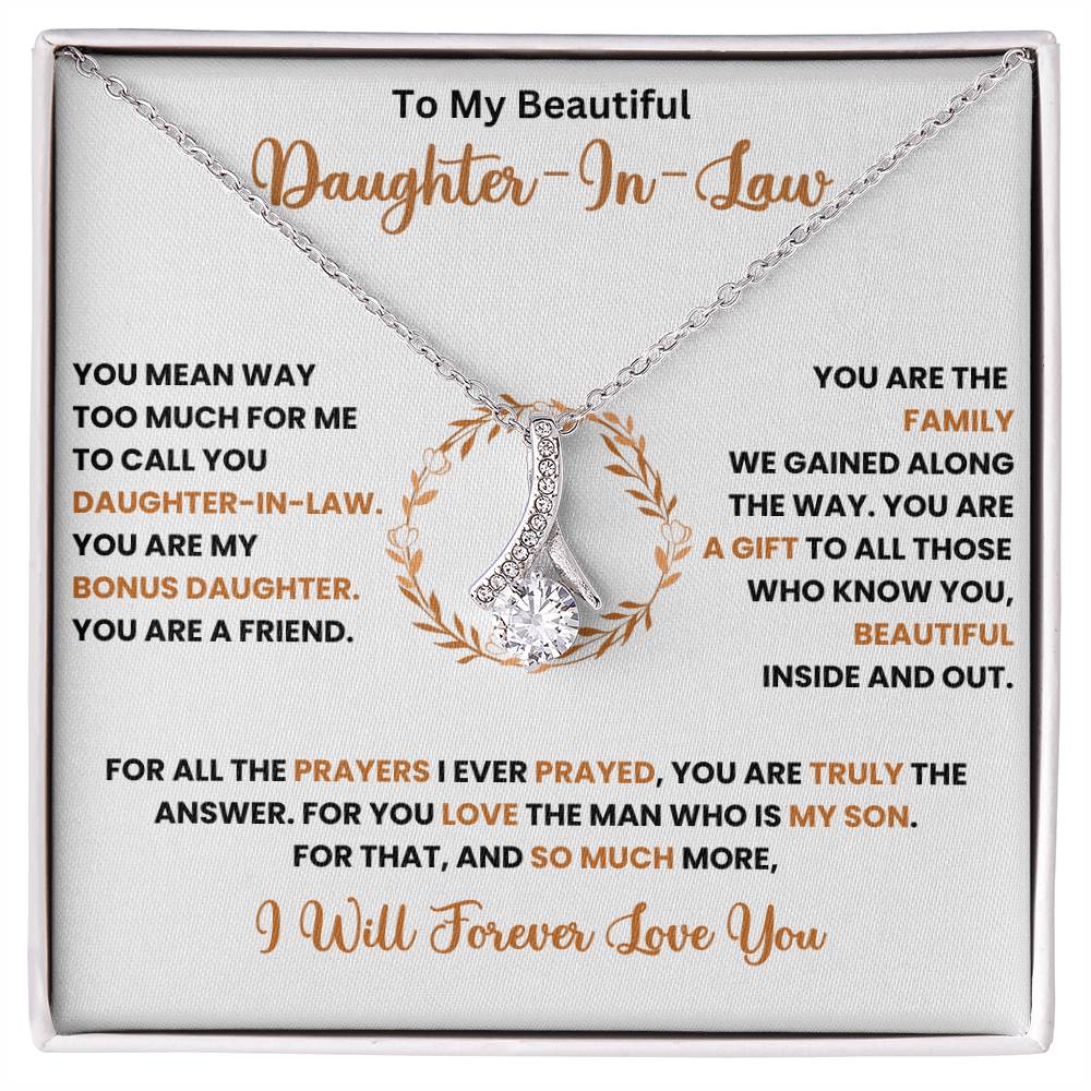 Alluring Beauty necklace for daughter-in-law, featuring a ribbon-shaped pendant with heartfelt message. Perfect gift for special occasions.