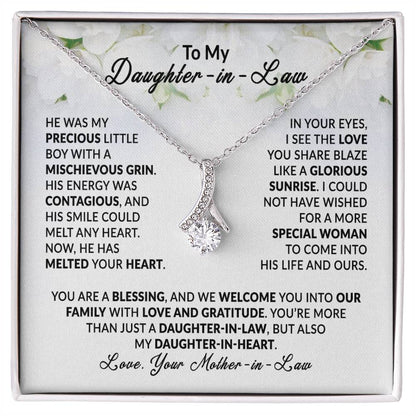 Alluring Beauty necklace gift box with heartfelt message to daughter-in-law, silver ribbon pendant with crystal.