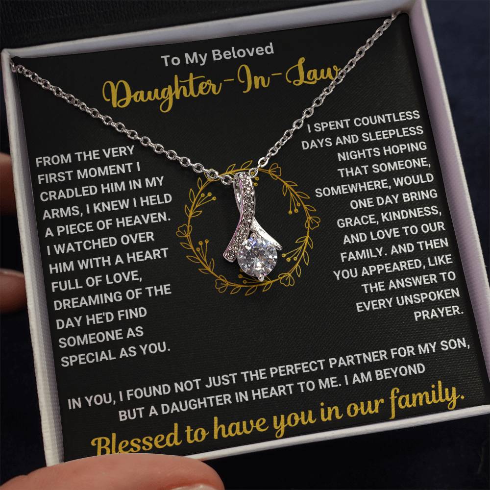 Beautiful necklace with sentimental message for daughter-in-law, featuring a stunning pendant in a gift box with heartfelt text