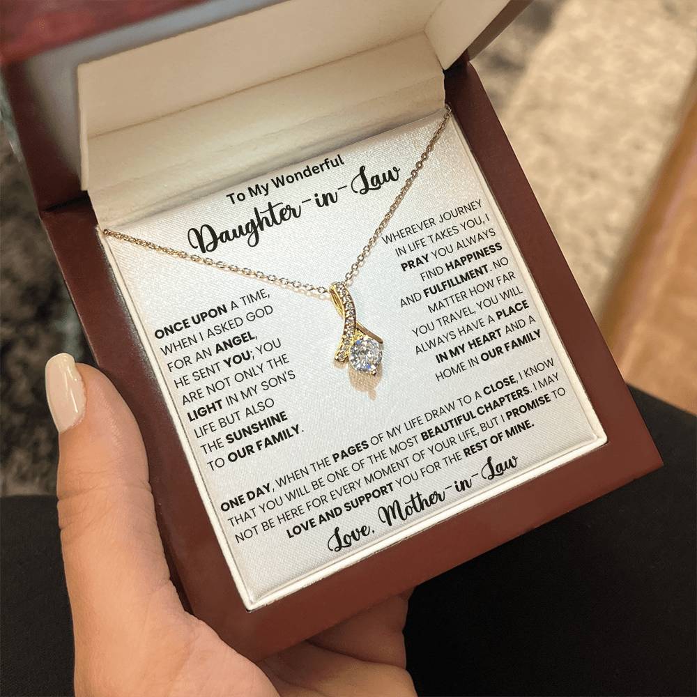 Alluring Beauty necklace with a petite ribbon shaped pendant in jewelry box with heartfelt message for daughter-in-law