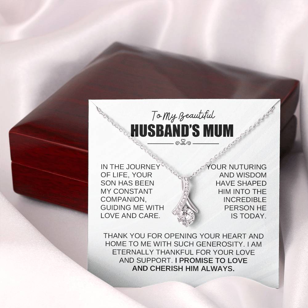 Necklace gift for husband’s mum with heartfelt message and elegant pendant on display.