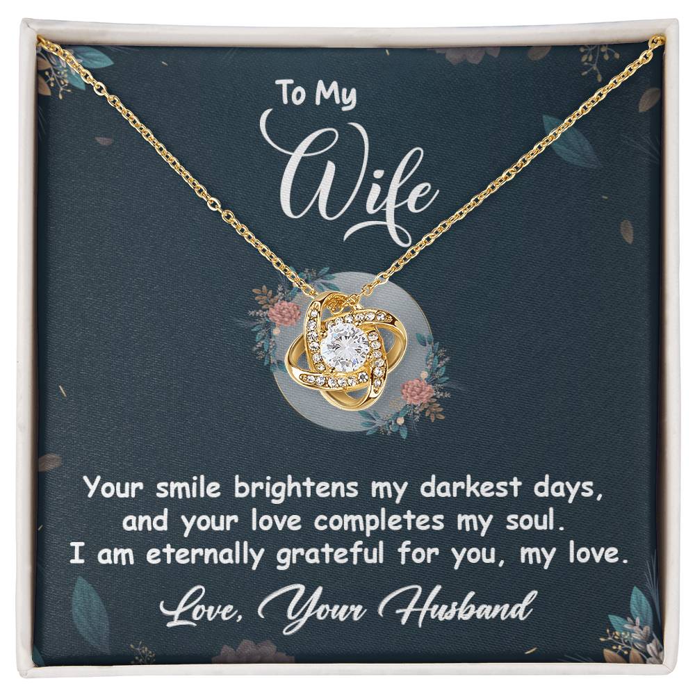 Love Knot Necklace with heartfelt message card for wife, featuring cubic zirconia crystals and floral design. Perfect gift for her.