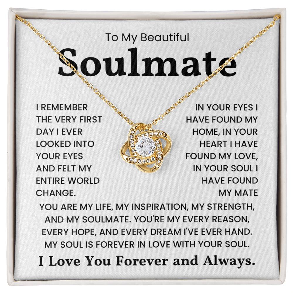 Gold love knot necklace on a message card with romantic text "To My Beautiful Soulmate".