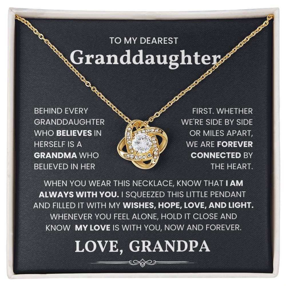 Gold love knot necklace with heartfelt message for granddaughter from grandpa, "Forever Connected by The Heart", in elegant gift box.