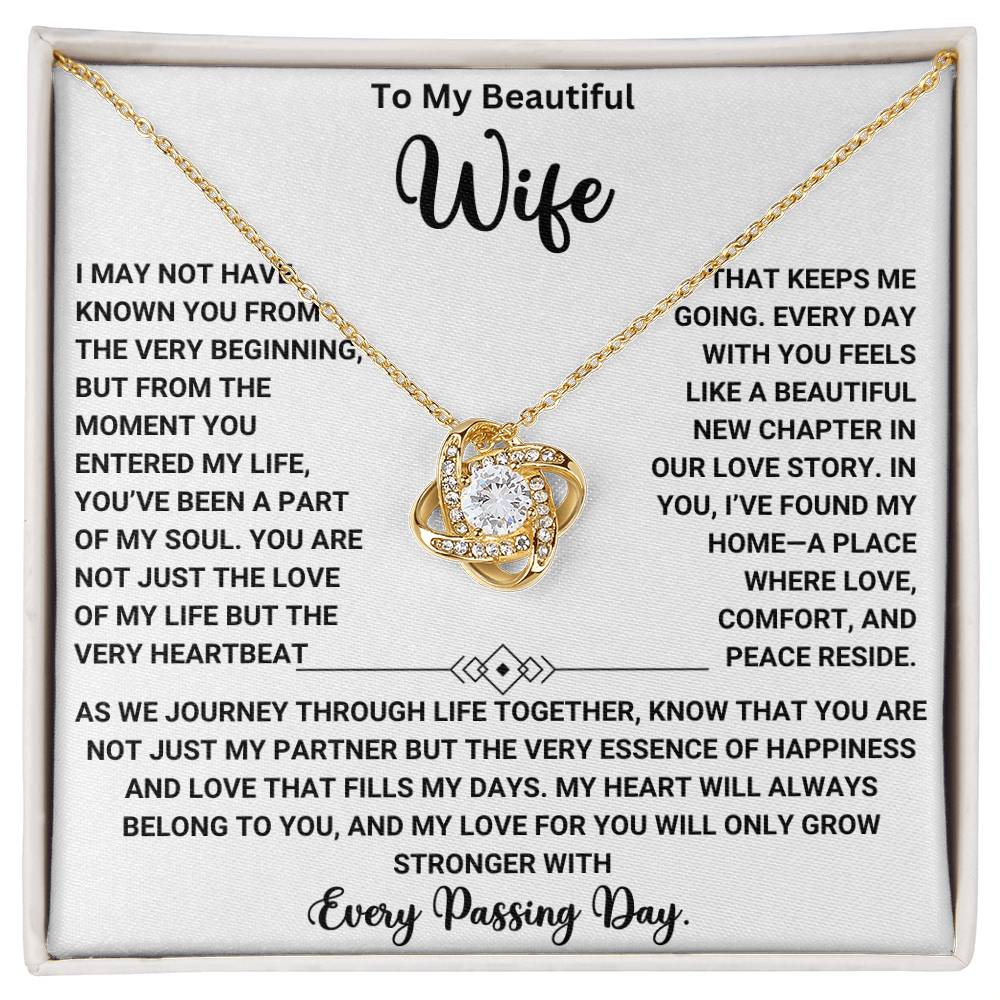 Love knot necklace gift for wife with heartfelt message, "To My Beautiful Wife - You've Been a Part of My Soul" on elegant card.