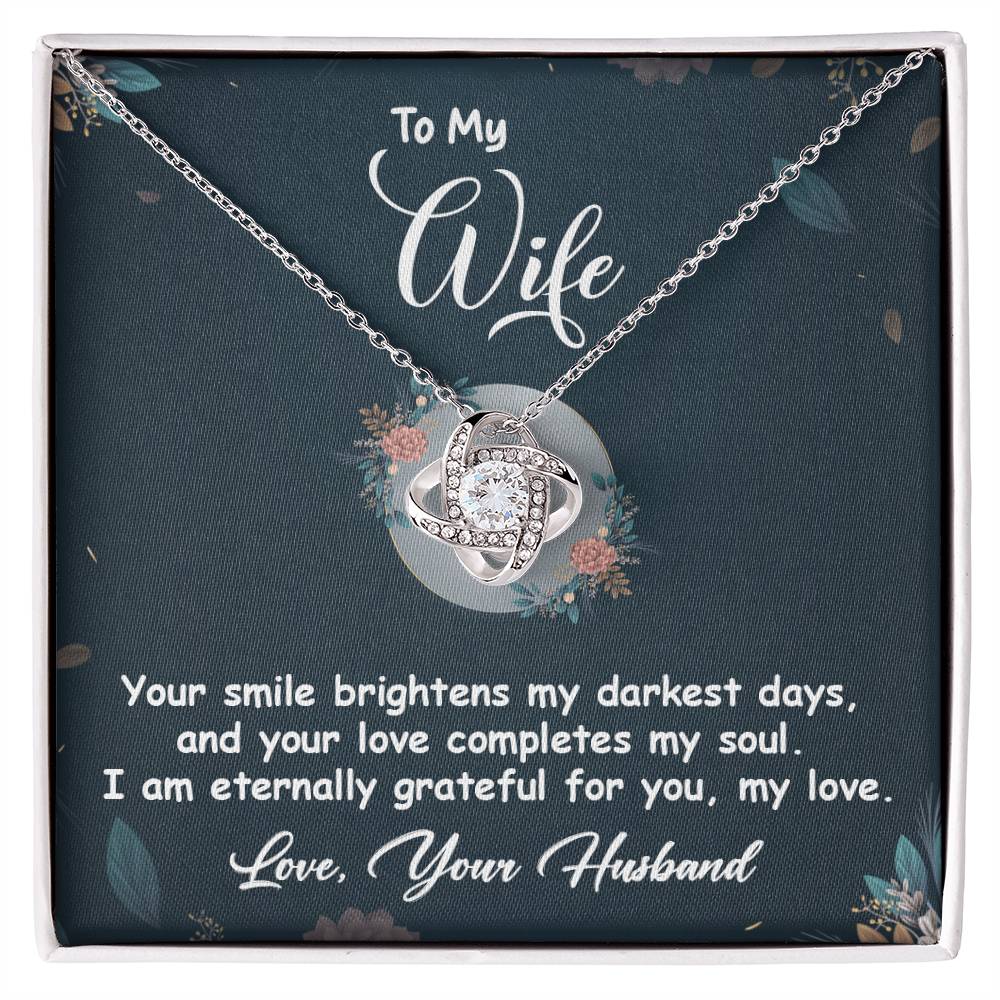 Love Knot Necklace with heartfelt message, "To My Wife - Your smile brightens my darkest days." Perfect anniversary gift for her.