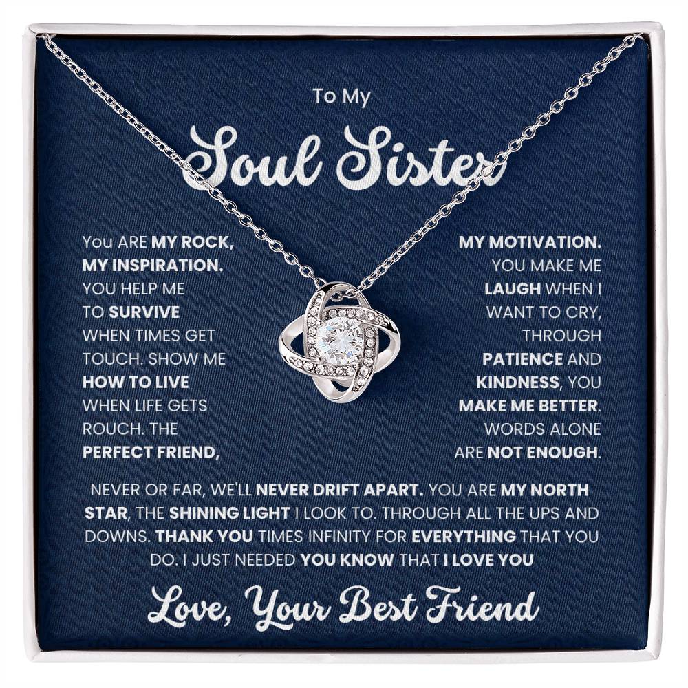 Love Knot Necklace with heartfelt message "To My Soul Sister - You Make Me Laugh When I Want to Cry" on a navy blue background.