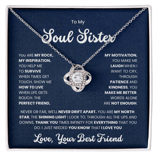 Love Knot Necklace with heartfelt message "To My Soul Sister - You Make Me Laugh When I Want to Cry" on a navy blue background.