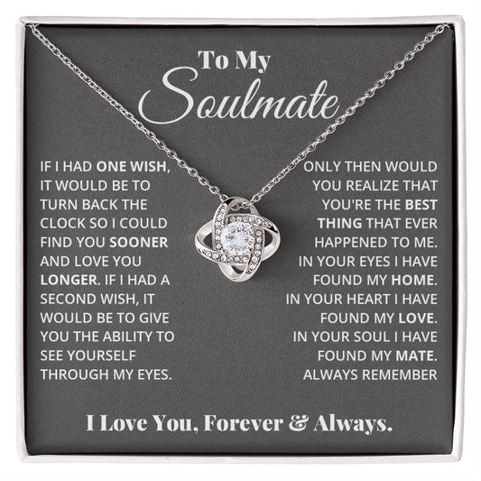 Love Knot Necklace with cubic zirconia crystals on a message card titled "To My Soulmate." The card's message expresses love and eternal bond.