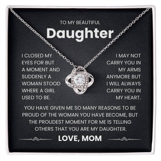 Love Knot Necklace gift for daughter with heartfelt message from mom about carrying her in heart, displayed in a box.