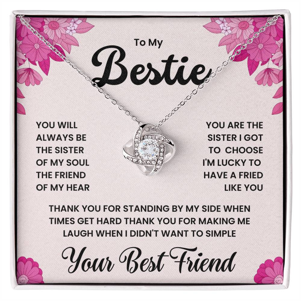 Love Knot Necklace for Bestie with heartfelt message - "You Will Always Be the Sister of My Soul" gift box on floral backdrop