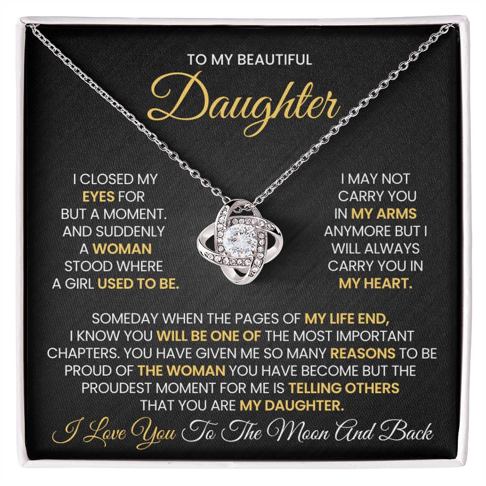 Love Knot Necklace for Daughter with sentimental message on elegant gift box, featuring cubic zirconia and choice of gold plating.