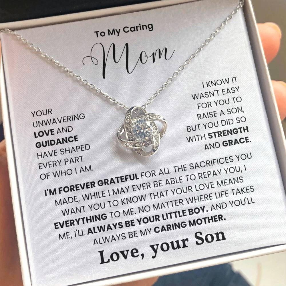 Love Knot Necklace for Mom with heartfelt message from son on white background in gift box