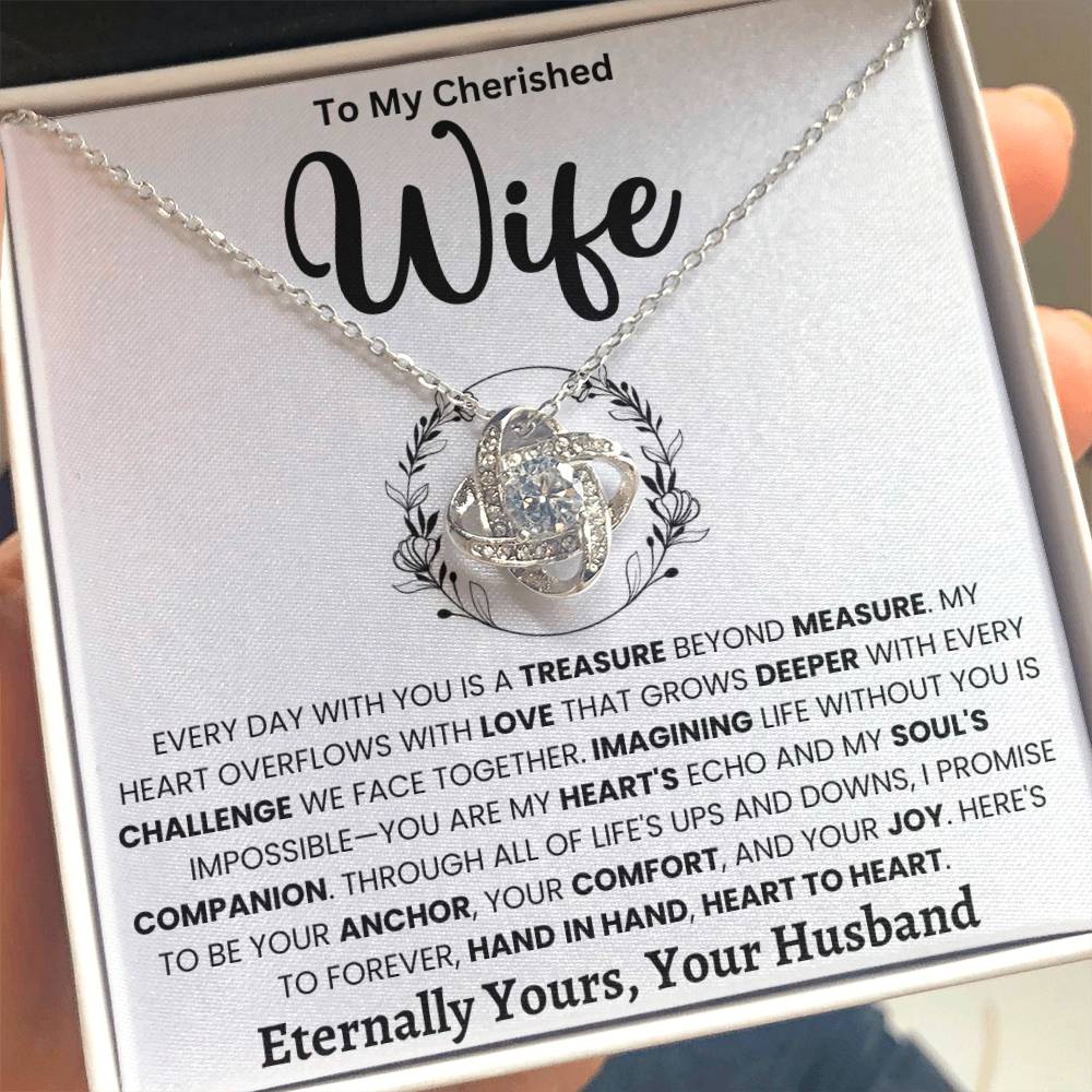 Love Knot Necklace in gift box with heartfelt message to cherished wife, featuring cubic zirconia and white gold design.