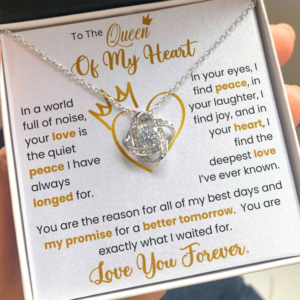 "To The Queen of My Heart Love Knot Necklace with premium cubic zirconia crystals displayed in a gift box with heartfelt message"