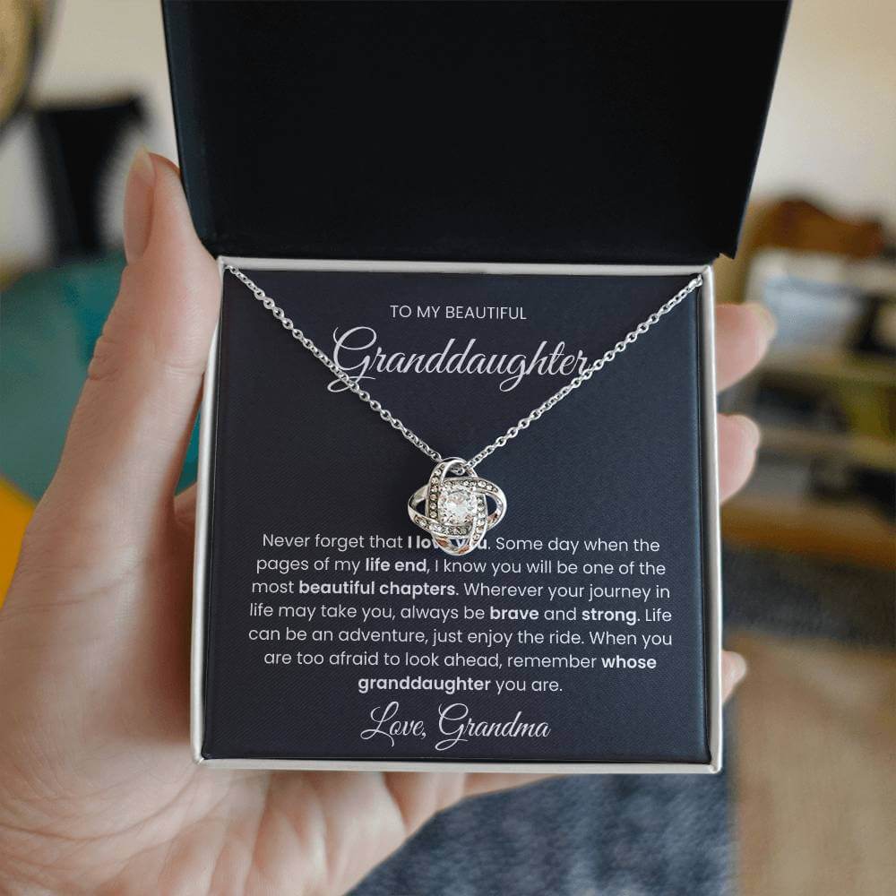 Love Knot Necklace gift for granddaughter with heartfelt message from Grandma, reading "Never forget that I love you."