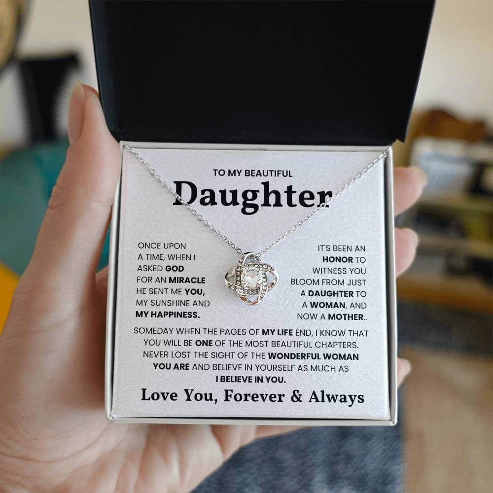 Love Knot Necklace gift for daughter with heartfelt message about motherhood and self-belief in a black gift box.