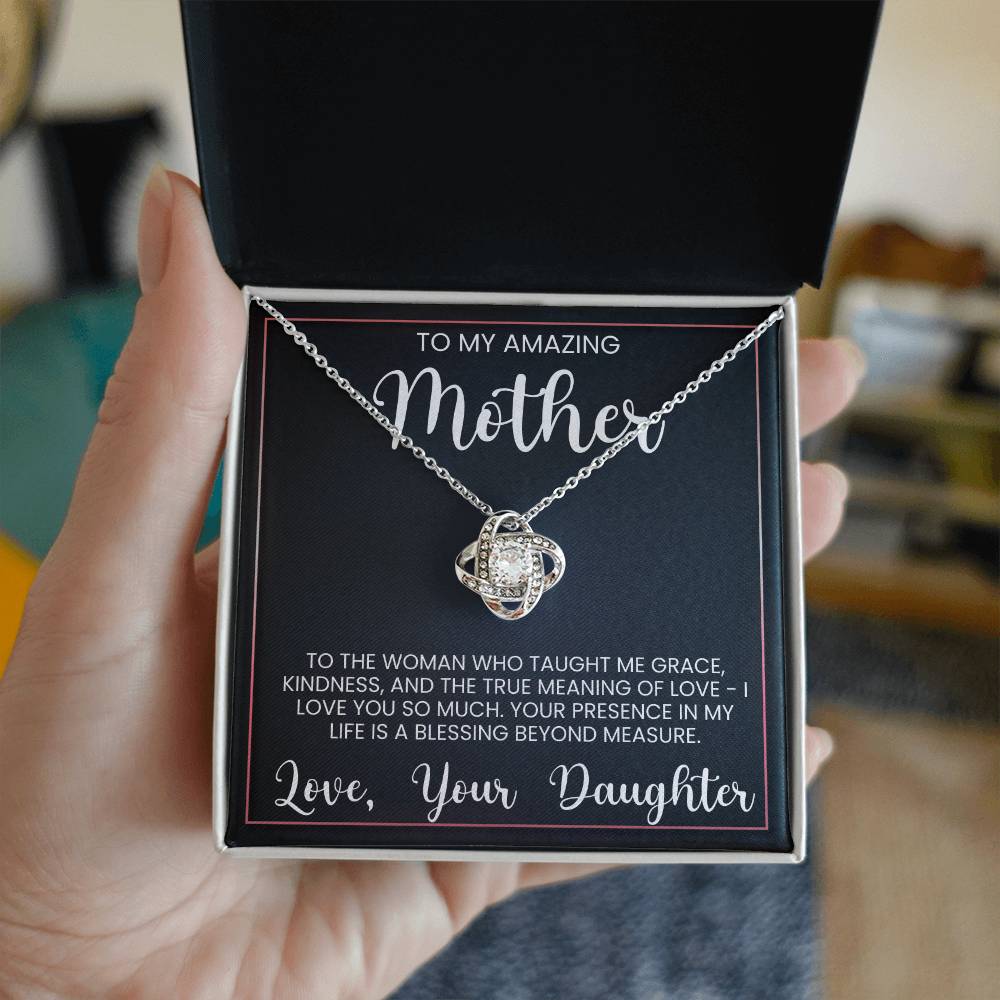 Love Knot Necklace for Mother with heartfelt message, perfect gift for Mother's Day. Premium cubic zirconia crystals representing an unbreakable bond.