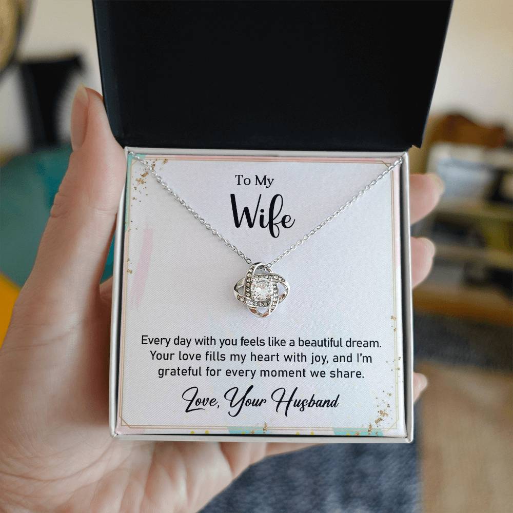 Love Knot Necklace gift box with heartfelt message to wife, featuring cubic zirconia crystals, perfect for expressing an unbreakable bond.