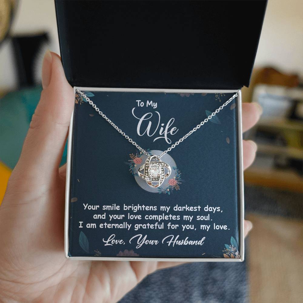 Love Knot Necklace gift for wife with heartfelt message, showcasing premium cubic zirconia crystals and elegant design in gift box.