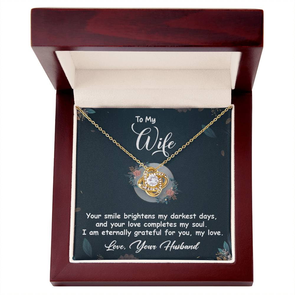 Love Knot Necklace in gift box with message "To My Wife - Your smile brightens my darkest days. Love, Your Husband," perfect romantic gift.