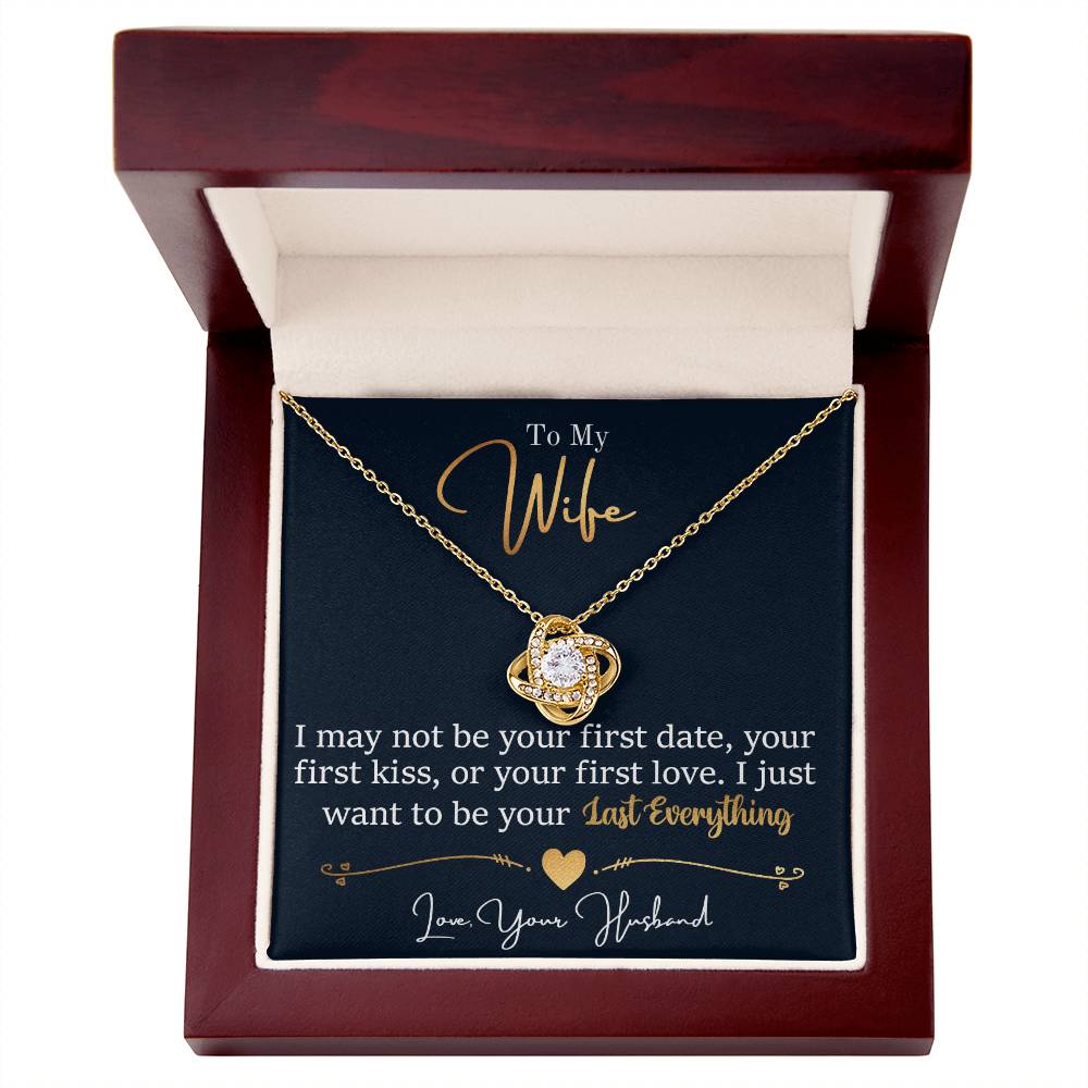 Love Knot Necklace in gift box with sentimental message to wife, featuring cubic zirconia stone in 18k yellow gold over stainless steel.