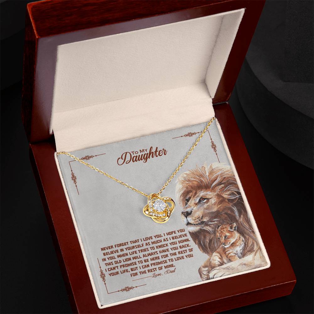 Love knot necklace gift for daughter with lion illustration, featuring cubic zirconia on a gold chain in a jewelry box with a heartfelt message