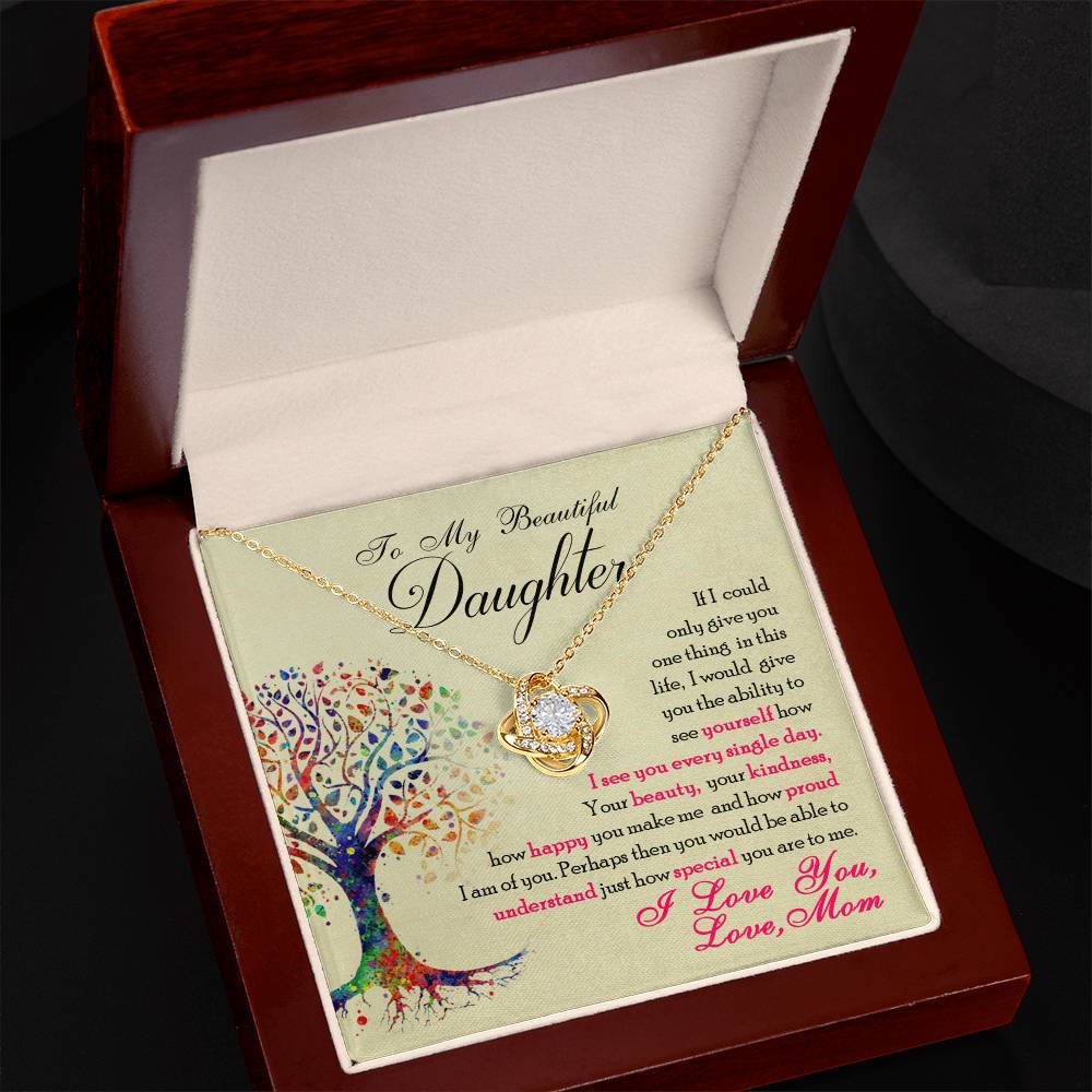 Love Knot Necklace in gift box with heartfelt message from mom to daughter, featuring cubic zirconia pendant and colorful tree design