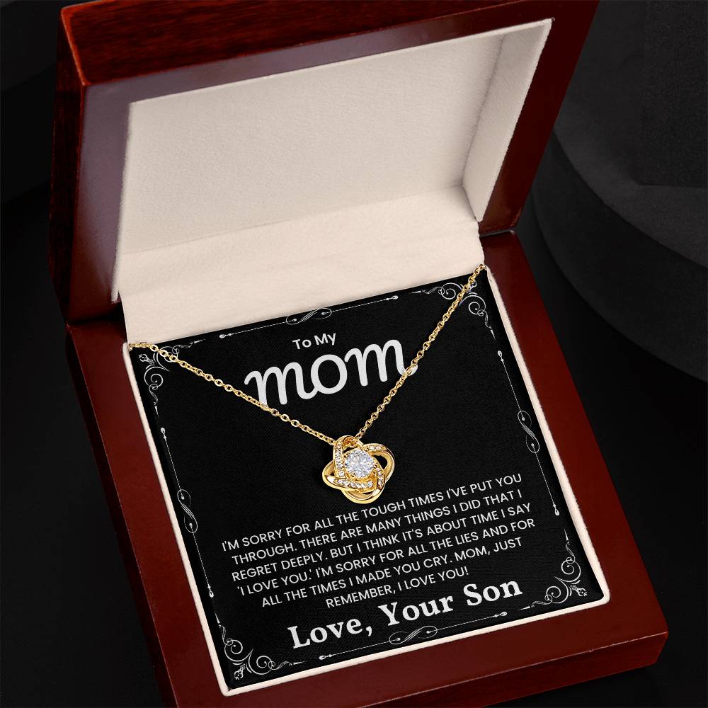 Love Knot Necklace in gift box with heartfelt message to mom from son, expressing love and apology for tough times.