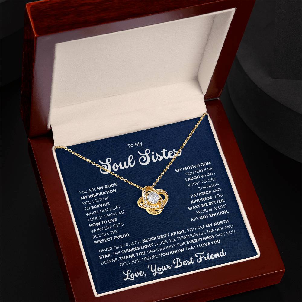 Gold love knot necklace for soul sister presented in a jewelry box with heartfelt message of friendship and inspiration