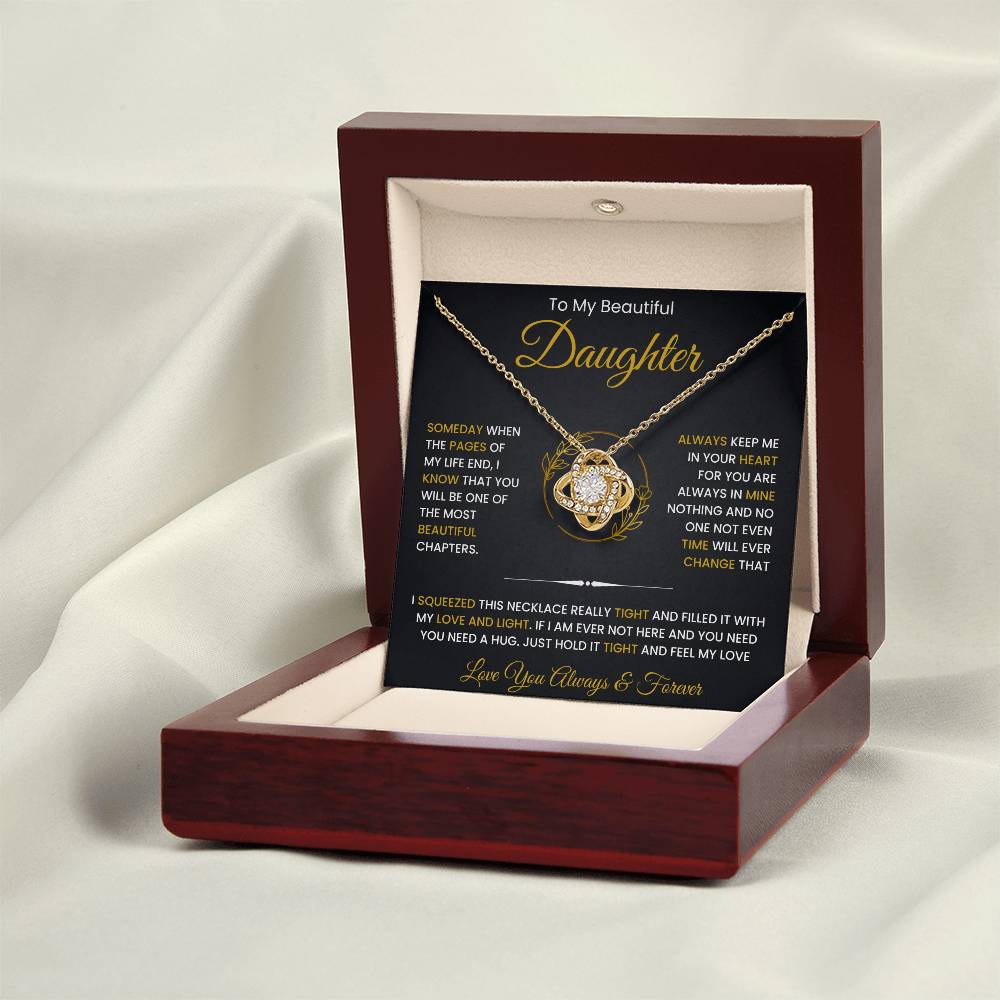 To My Beautiful Daughter Love Knot Necklace in gift box, 14k white gold or 18k yellow gold, embellished with cubic zirconia crystals.