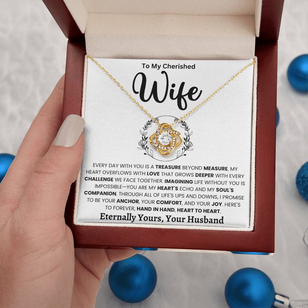 Love Knot Necklace in gift box with a sentimental message to wife, featuring cubic zirconia and gold finish.