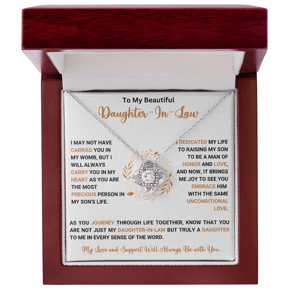 Love Knot Necklace for Daughter In Law with heartfelt message in elegant gift box, perfect gift for expressing unconditional love and support.