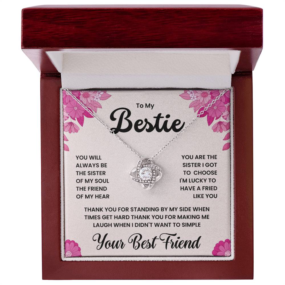 Love Knot Necklace for Bestie with heartfelt message expressing unbreakable bond, in elegant jewelry box with floral accents.