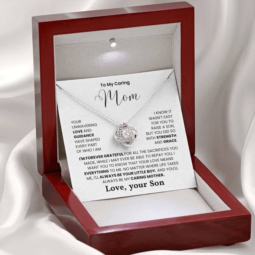 Love Knot Necklace for Mom with heartfelt message from son in elegant red gift box.