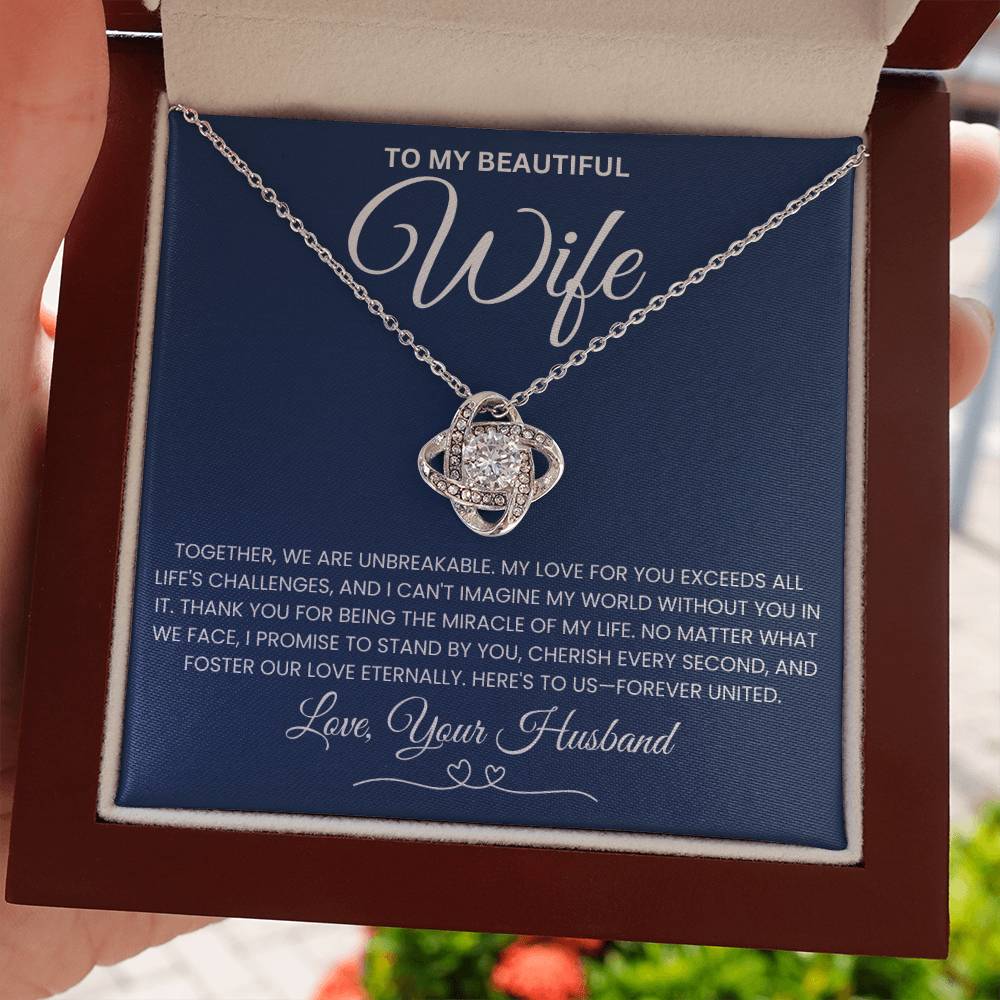 Love Knot Necklace gift box with romantic message for wife, featuring a pendant with cubic zirconia on a delicate chain.