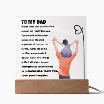 Square acrylic plaque with heartfelt message from daughter to dad, featuring a silhouette of a man carrying a child on his shoulders.