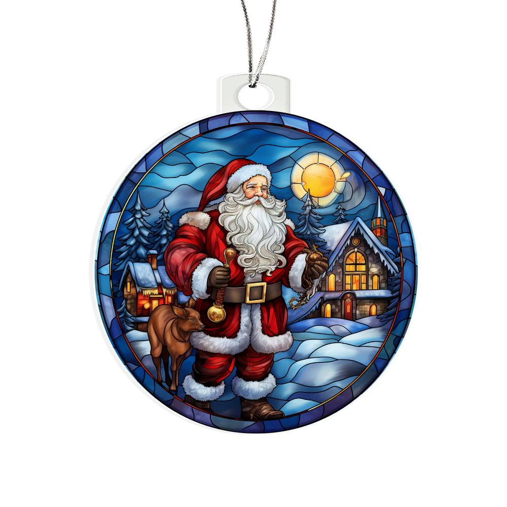 Christmas acrylic ornament featuring Santa, cozy cabin, and snow-covered trees in a winter sunset scene with holiday cheer.