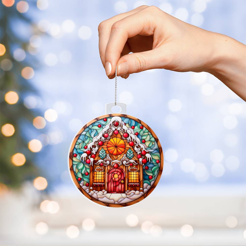 Hand holding Christmas acrylic ornament with candy cane and gingerbread-style house design, stained-glass effect, festive holiday decor.